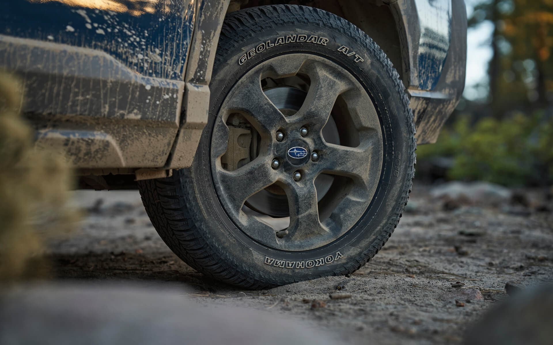 A close up of the matte black, all-terrain tires on the 2022 Subaru Forester Wilderness.