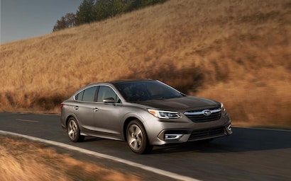 2022 Subaru Legacy driving on road.