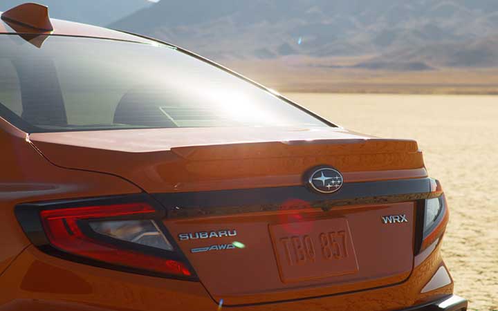 A 2022 Subaru WRX driving in the desert.